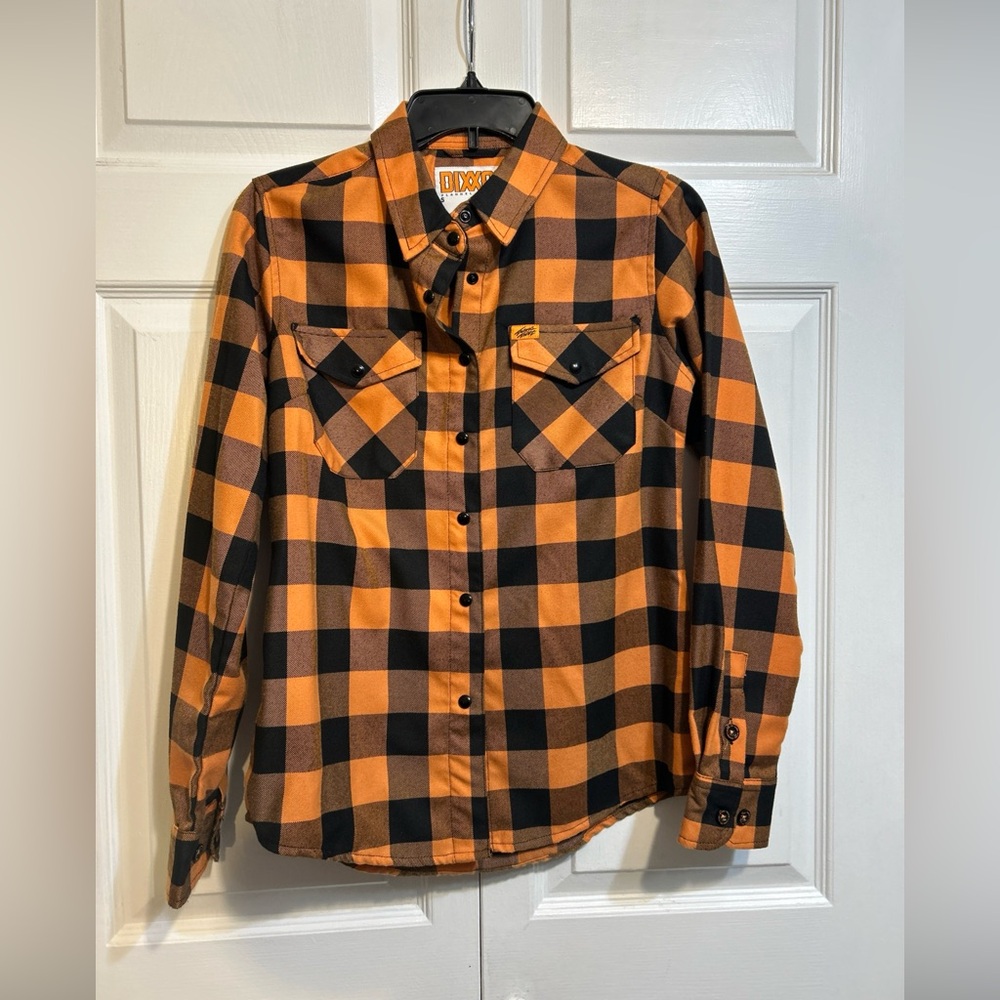 7/9/26 Dixxon Flannel Co Travis Tritt Size S Small Orange/Black Plaid Pearl Snap